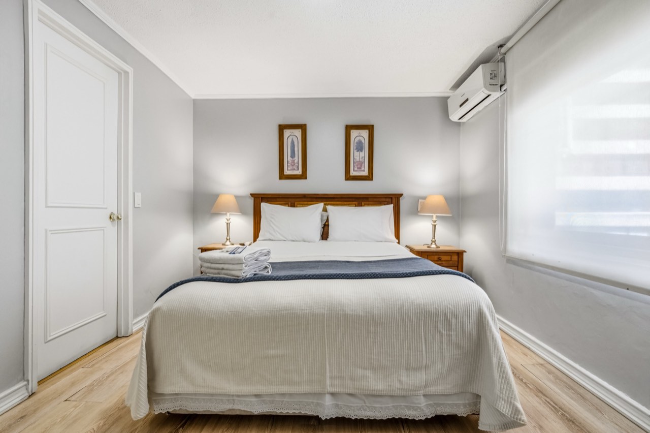 Dormitorio principal vista amplia - Suite 803 Suites Vitacura